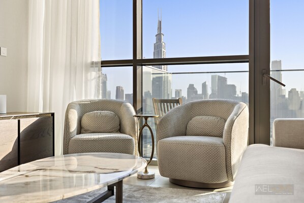 Deluxe Apartment | Living area - WelHome - Cozy 3BR With Maids Room & Access to Dubai Mall (Dubai)