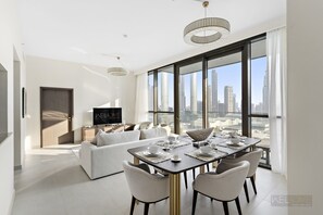 Deluxe Apartment | Dining room - WelHome - Cozy 3BR With Maids Room & Access to Dubai Mall (Dubai)