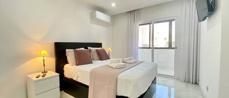 Apartment, 1 Bedroom, Balcony | 1 bedroom, bed sheets