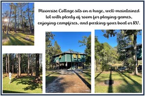 A well-maintained cottage with a large yard, a play area, and a covered porch.