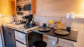 Fridge, coffee/tea maker, cookware/dishes/utensils