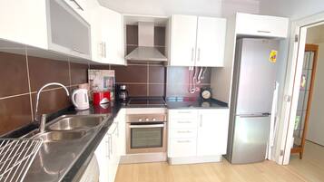 Apartment, 2 Bedrooms, Terrace | Private kitchen | Microwave, oven, dishwasher, coffee/tea maker