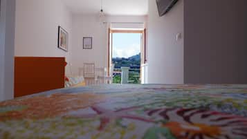 Monolocale arancia | 1 Schlafzimmer, hochwertige Bettwaren, Daunenbettdecken