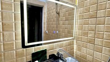 Hair dryer, towels, soap, shampoo