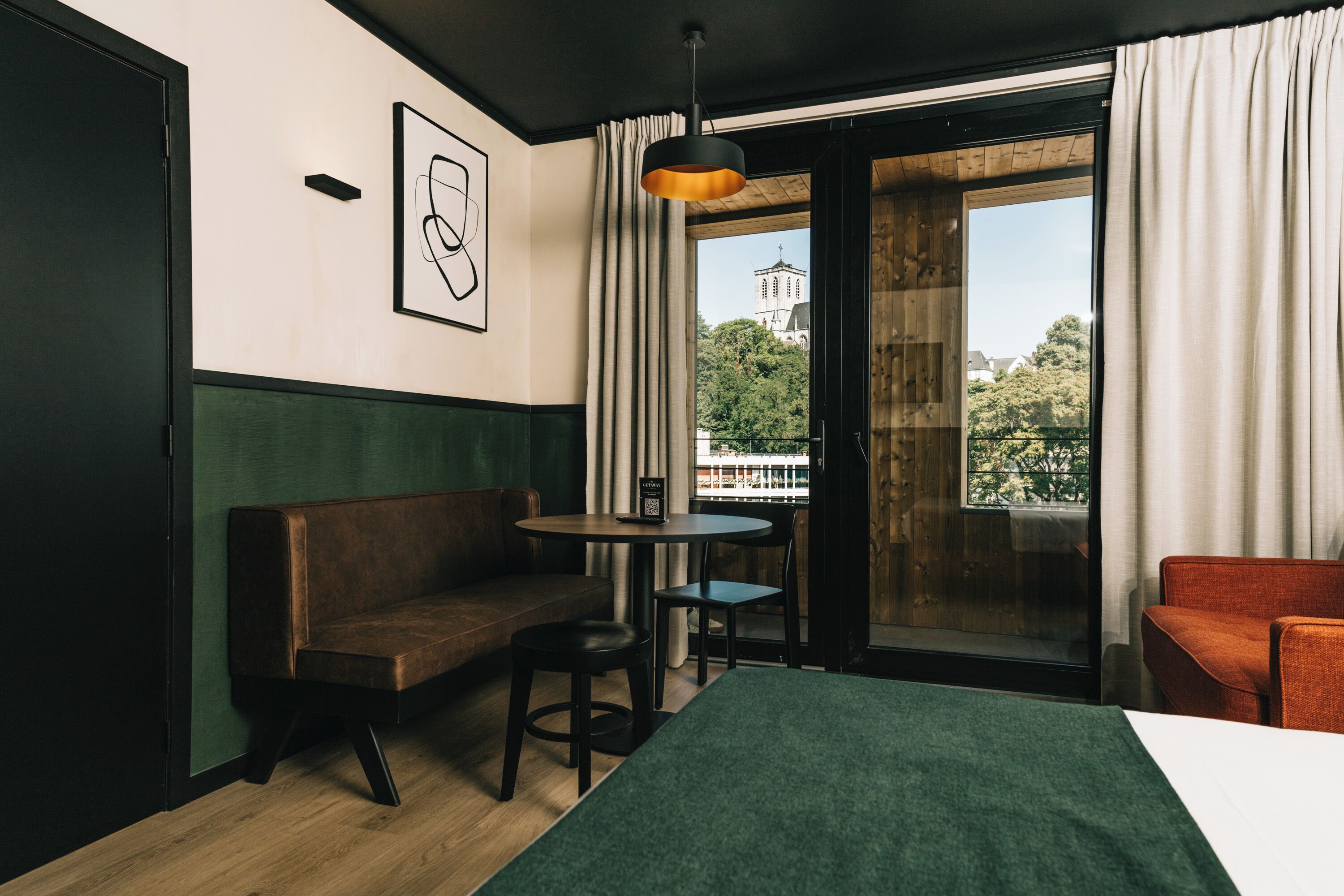 Deluxe Studio with balcony | Living area | 42-inch flat-screen TV with digital channels