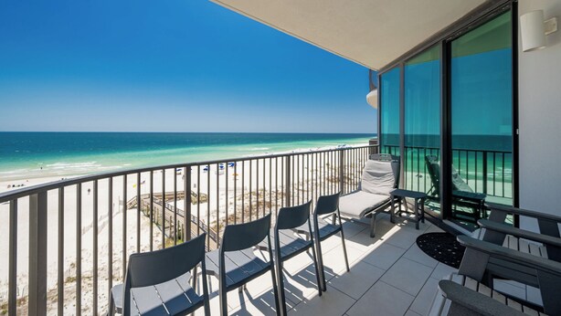 A balcony with a view of the beach and ocean. - Beautiful Gulf Front Condo - Phoenix IX 506 (Orange Beach)