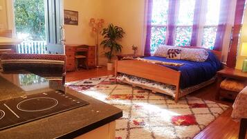 1 bedroom, desk, iron/ironing board, travel crib