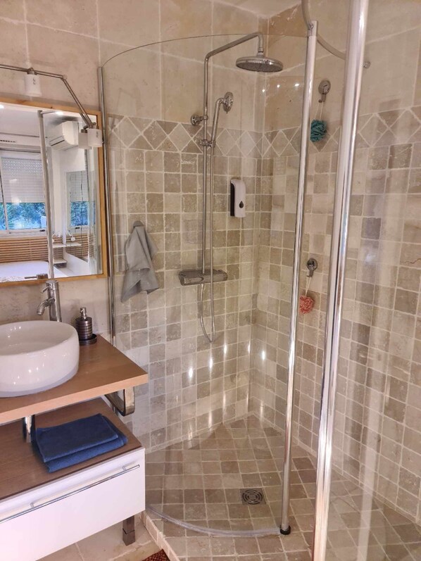 Shower, hair dryer, towels, soap