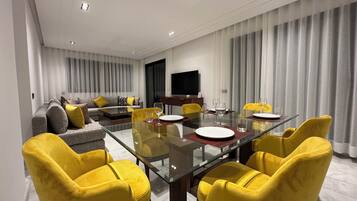 50-inch flat-screen TV with satellite channels, TV, pay movies