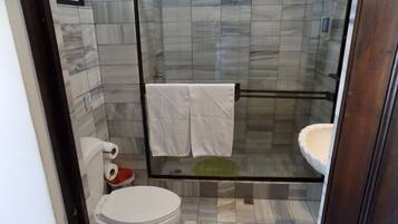 Hair dryer, towels, soap, shampoo