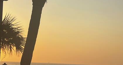 Amazing sunrises & beach views from private balcony & steps from the sand!!