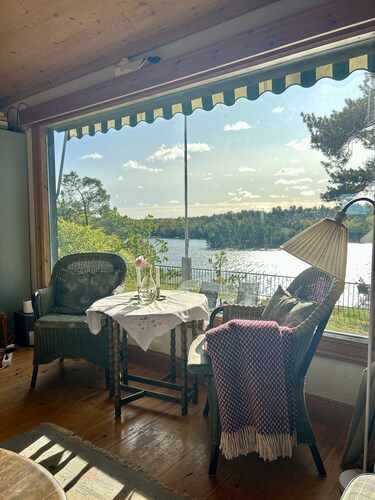 Waterfront villa in Långstrandsudd: Panoramic views, private sauna, and dock
