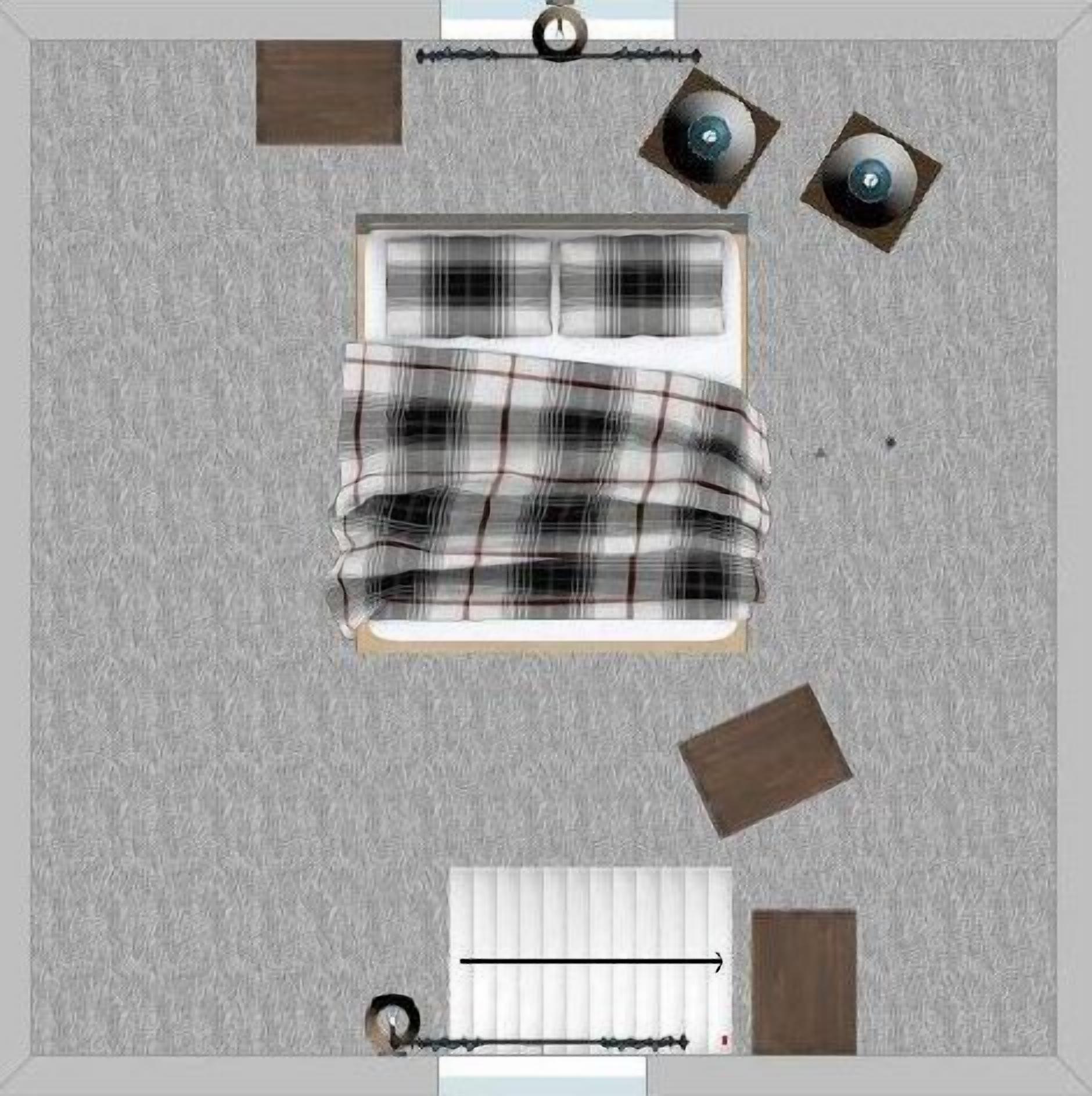 A bedroom with a bed, two bedside tables, a window with blinds, and a door.