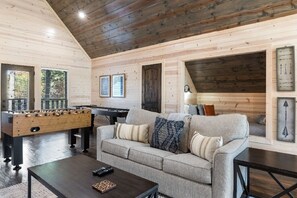 Smart TV, fireplace, video games, foosball