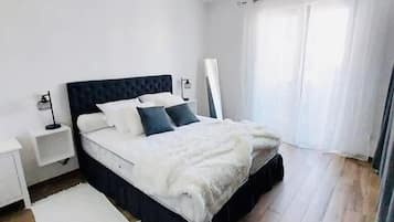 2 bedrooms, desk, laptop workspace, iron/ironing board