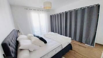 2 bedrooms, desk, laptop workspace, iron/ironing board