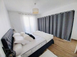 2 bedrooms, desk, laptop workspace, iron/ironing board