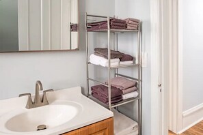 Hair dryer, towels, soap, toilet paper