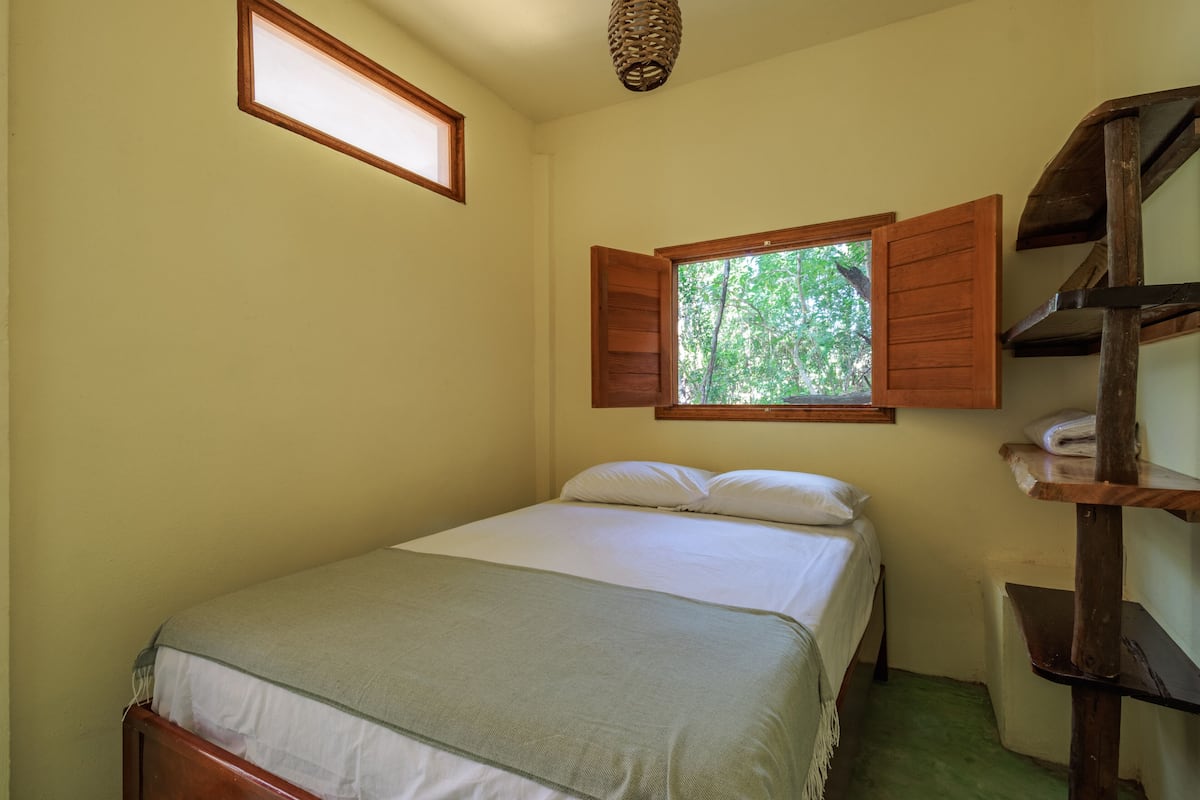 Economy Room | Desk, laptop workspace, iron/ironing board, individually decorated