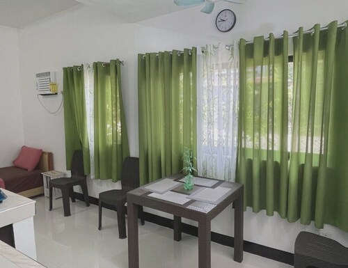 Near white-sand beaches! Studio type w/ A/C & kitchen @ Talikud Island.