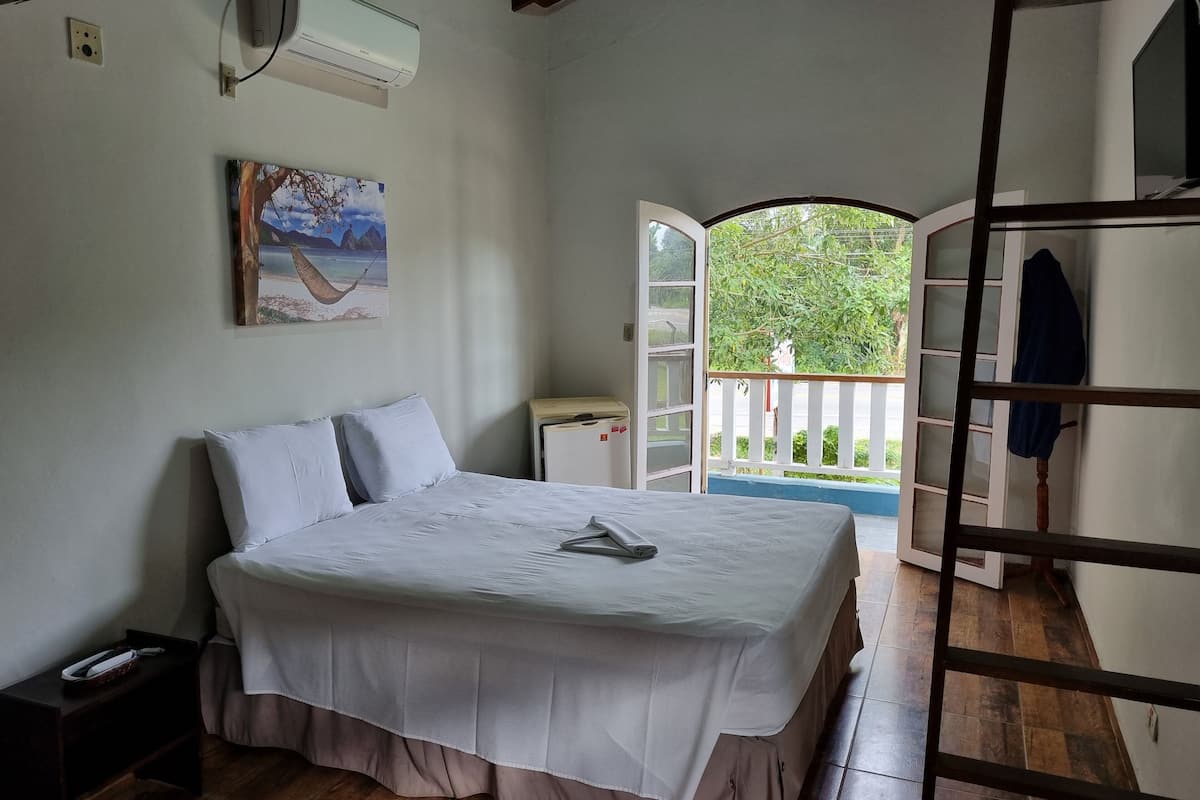 Habitación cuádruple exclusiva | Decoración individual, wifi gratis, ropa de cama