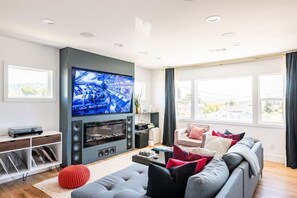 Smart TV, fireplace, books