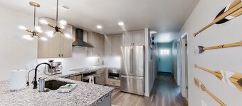 Contemporary, dog-friendly townhouse with balcony, pool & day docks