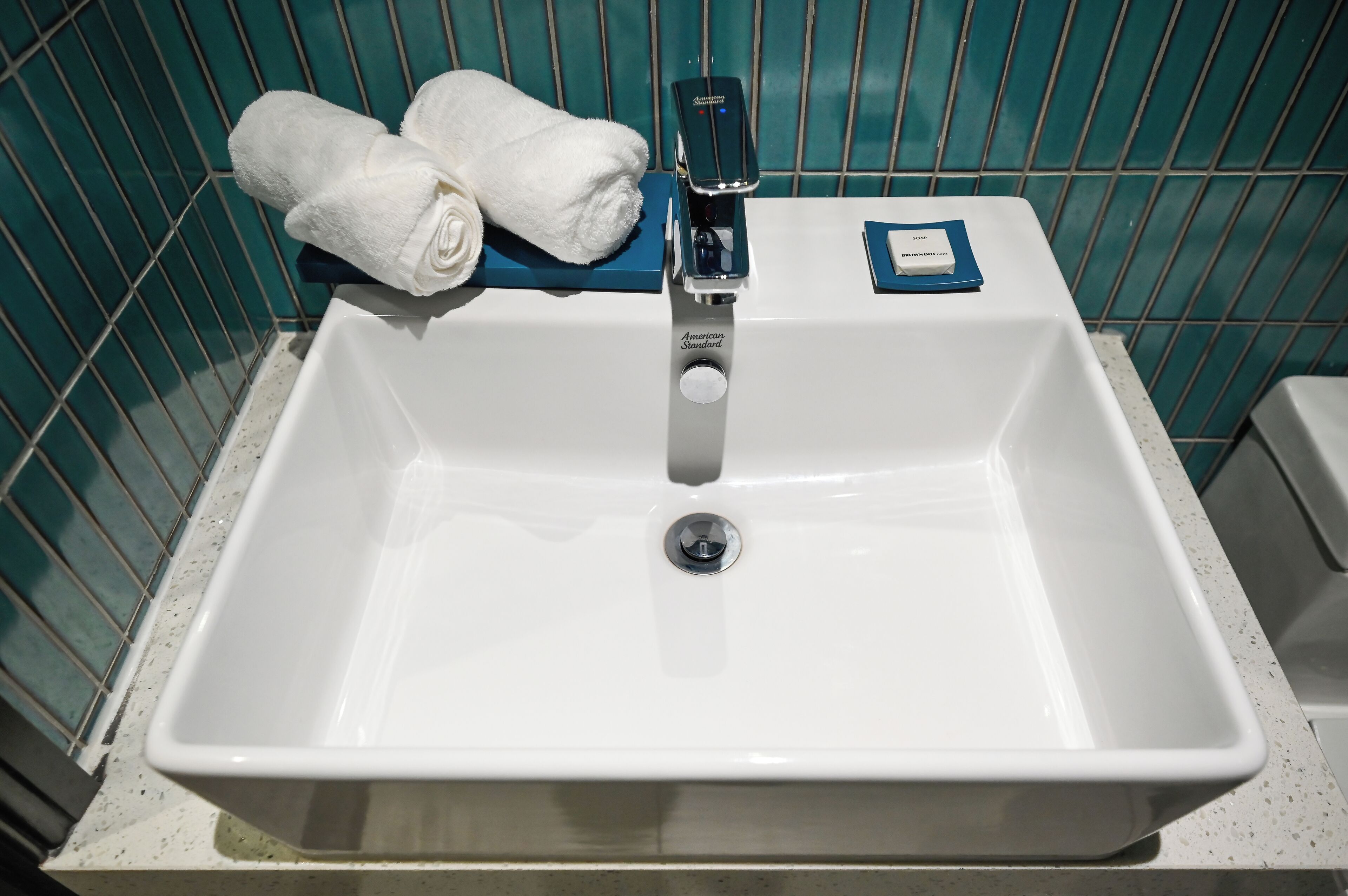 deluxe double room | bathroom | shower, eco-friendly toiletries, hair dryer, slippers