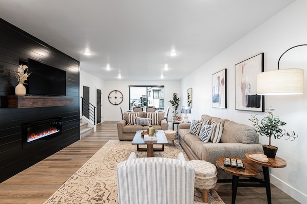 TV, fireplace, books