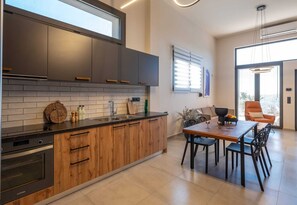 Fridge, microwave, dishwasher, coffee/tea maker