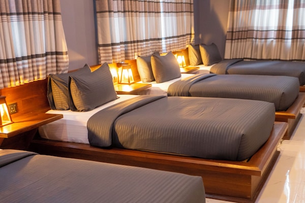 Luxury Room, Multiple Beds, Non Smoking, Garden View | 1 bedroom, desk, laptop workspace, soundproofing