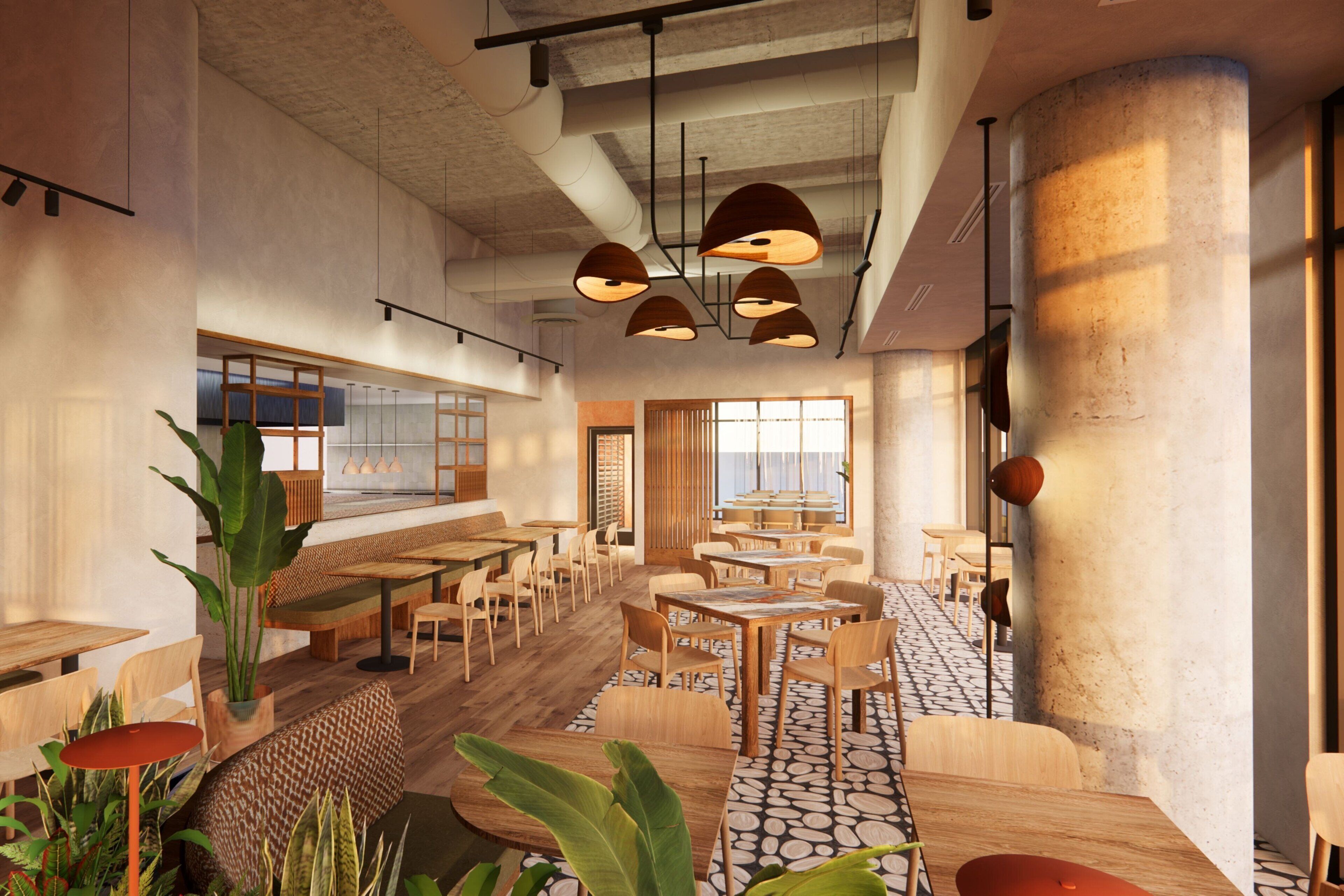 A modern restaurant interior with wooden tables and chairs, pendant lighting, and large windows allowing natural light.