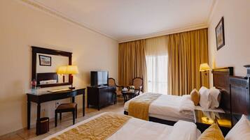 Premium bedding, in-room safe, individually decorated