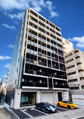 Experience the sleek, contemporary design of this multi-story building, featuring spacious balconies and convenient parking.