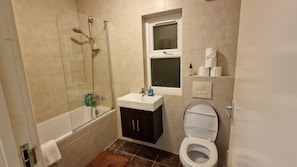 Studio | Bathroom | Combined shower/tub, deep soaking tub, towels