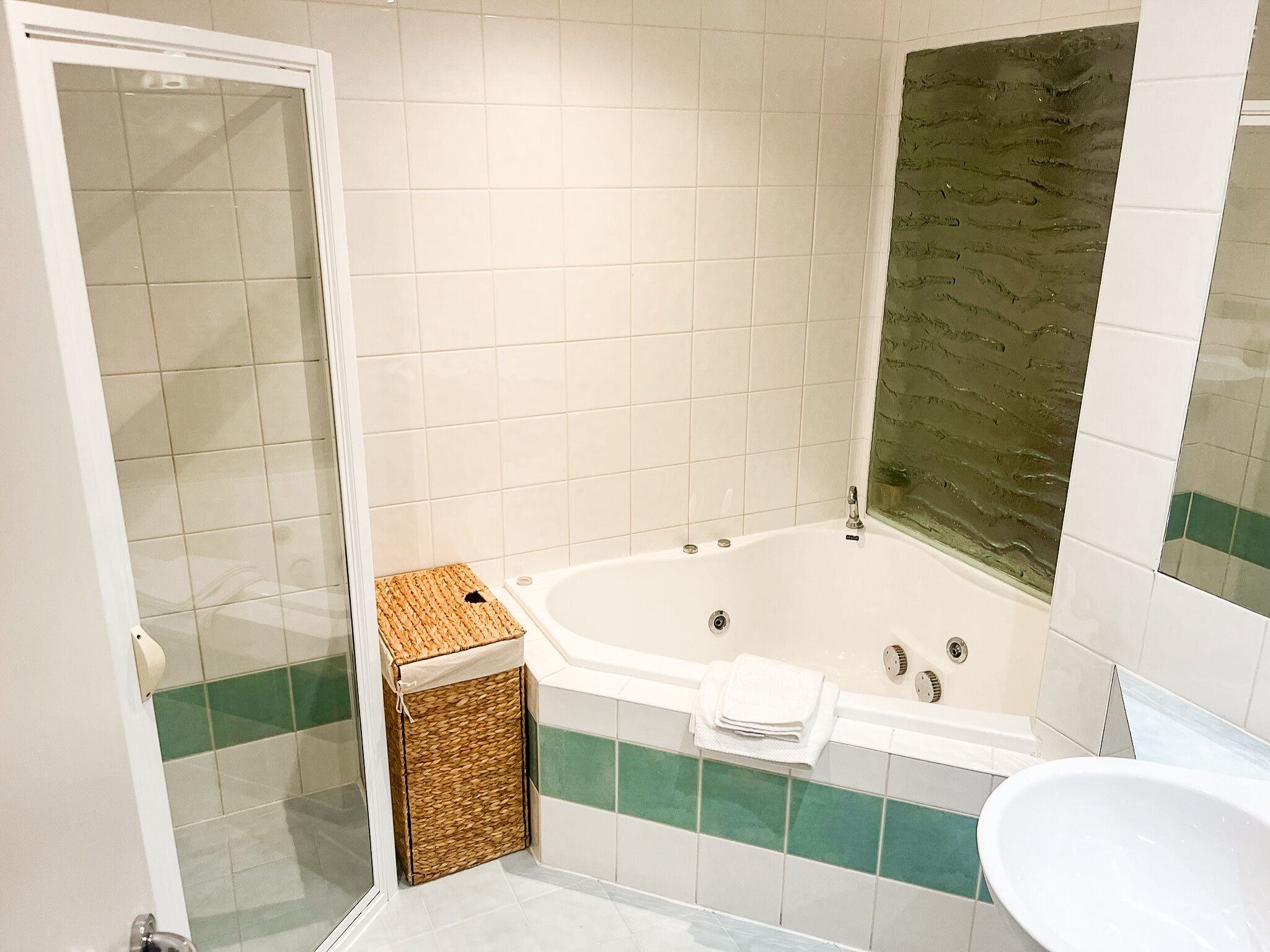 Jetted bath, hair dryer, towels, soap