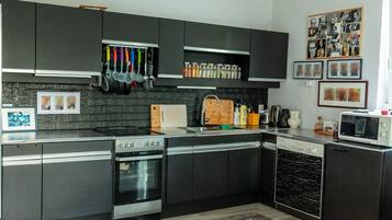 Apartment | Private kitchen | Fridge, microwave, oven, stovetop