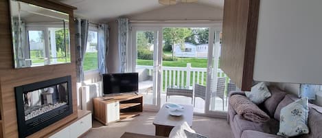 Cabin, Multiple Beds | Living area | Fireplace