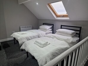 Departamento | 3 habitaciones, tabla de planchar con plancha y wifi gratis 
