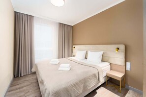 1 slaapkamer, een strijkplank/strijkijzer, wifi, beddengoed