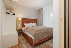 1 chambre, fer et planche à repasser, Wi-Fi, draps fournis