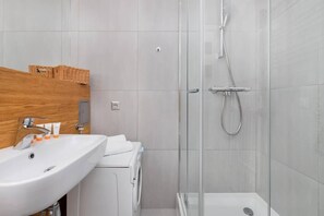 Shower, hair dryer, shampoo