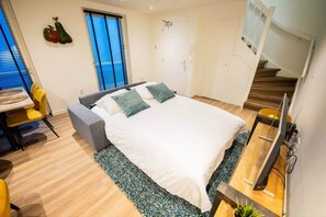 1 slaapkamer, een strijkplank/strijkijzer, wifi, beddengoed