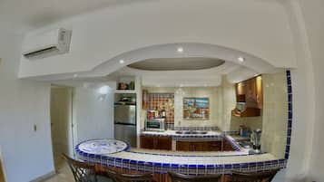 Condo, 2 Bedrooms | Private kitchen | Fridge, oven, coffee/tea maker
