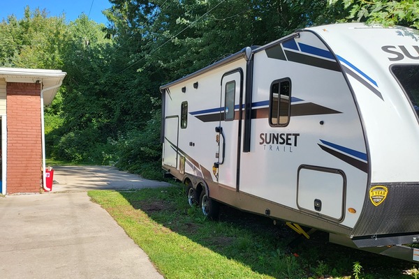 Guest Parking behind trailer on concrete pad