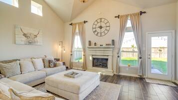 TV, fireplace, books