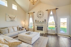 TV, fireplace, books