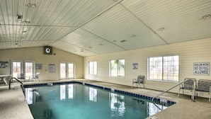 An indoor swimming pool with clear signage, including 'No Diving' and 'Shallow Water No Diving' warnings. - Myrtle Beach Oasis Condo w/ Pool Access! (Myrtle Beach)