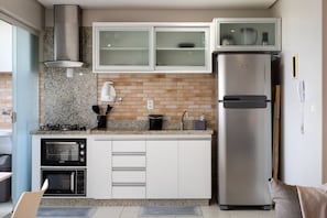 Apartment | Private kitchen | Fridge, microwave, toaster oven, cookware/dishes/utensils