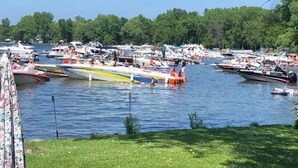 A marina with multiple boats docked.